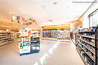 Interior view of the dm drugstore in the Hanover Vahrenwald office and commercial building.