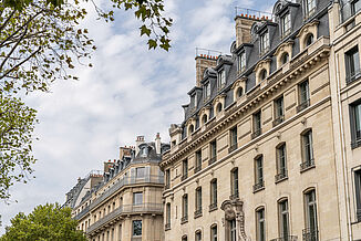 Facade of the Boulevard Haussmann building complex in Paris.